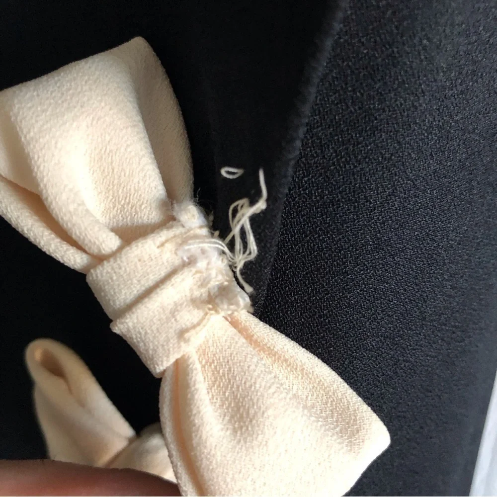 Vintage Leslie Fay black dress with bow detailing in size 12